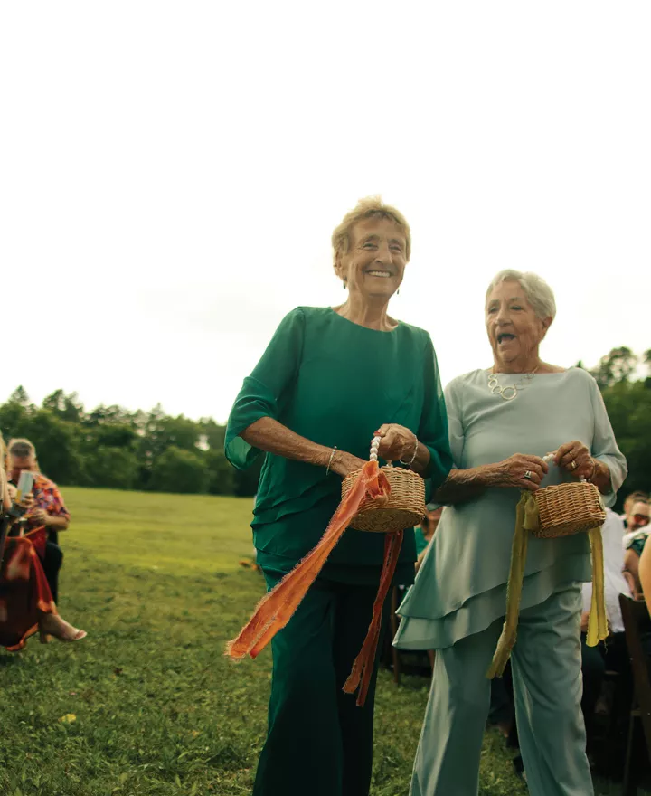 Flower grandmas descend the aisle