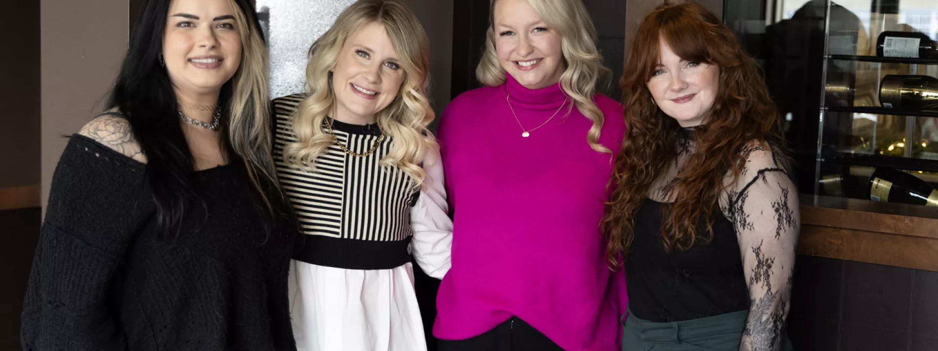 Gemma-Louise Sherman and Brittany Desmondez of Bridal Beaut with Wedding Day Podcast hosts Sonja Babich and Brittany O’Neill, gathered at a stylish venue in Wisconsin for an insightful discussion on bridal hairstyling trends and wedding beauty.