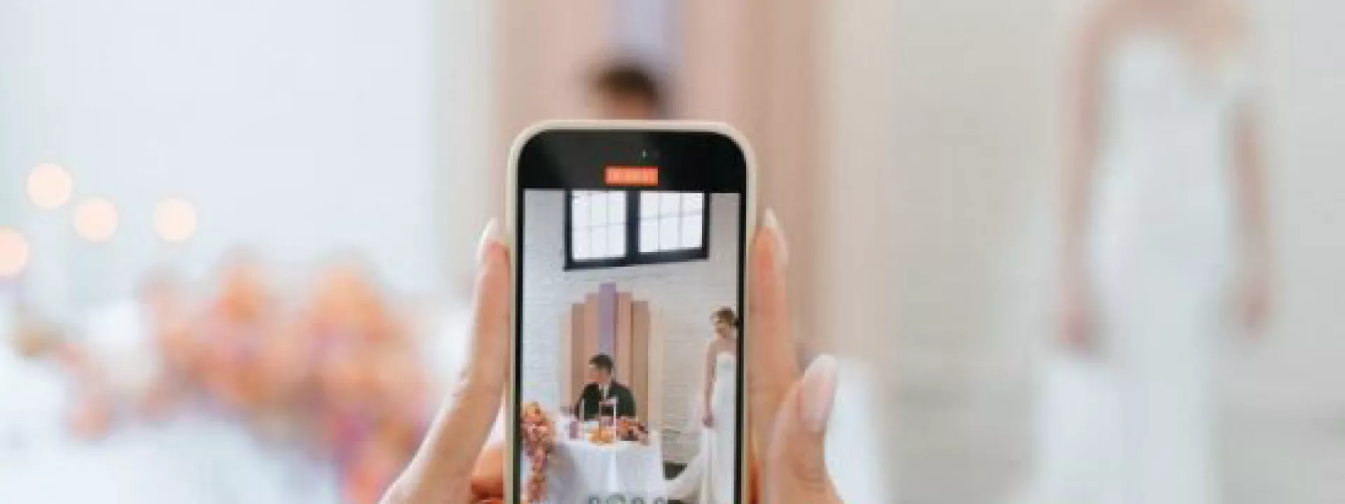 Content creator taking candid video of a bride