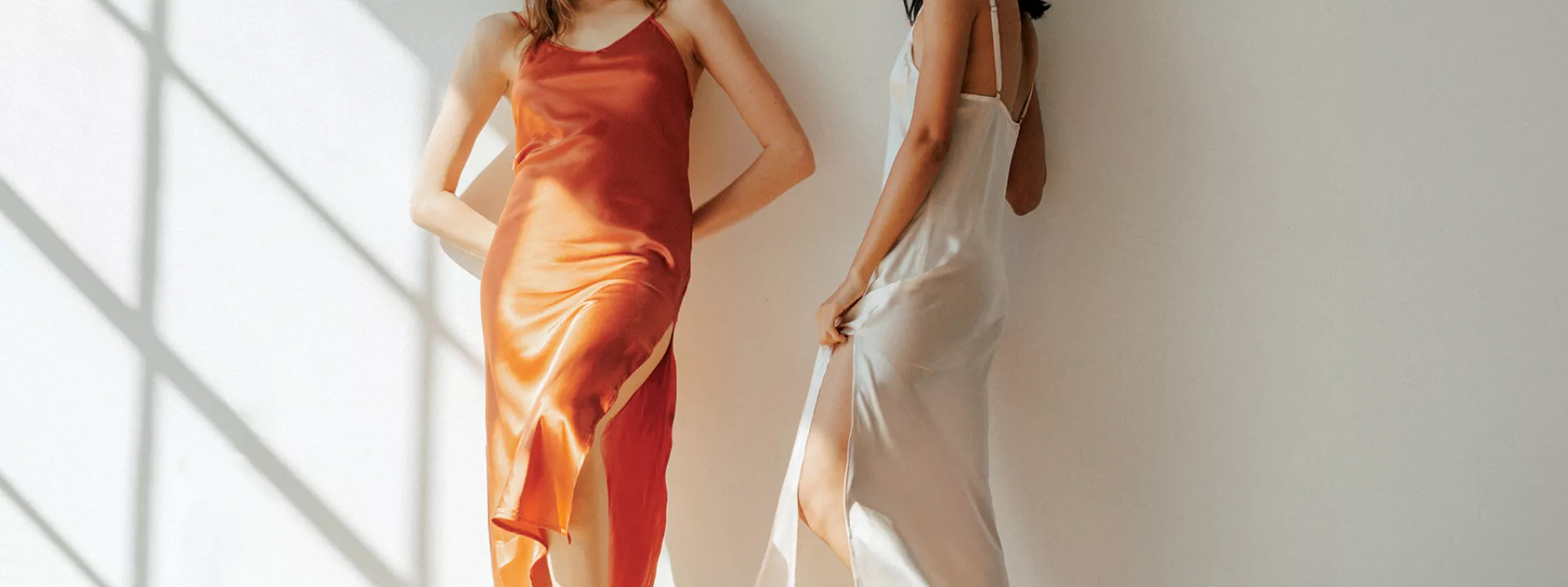 Two Models Pose in The Ruby Dress by Vincente
