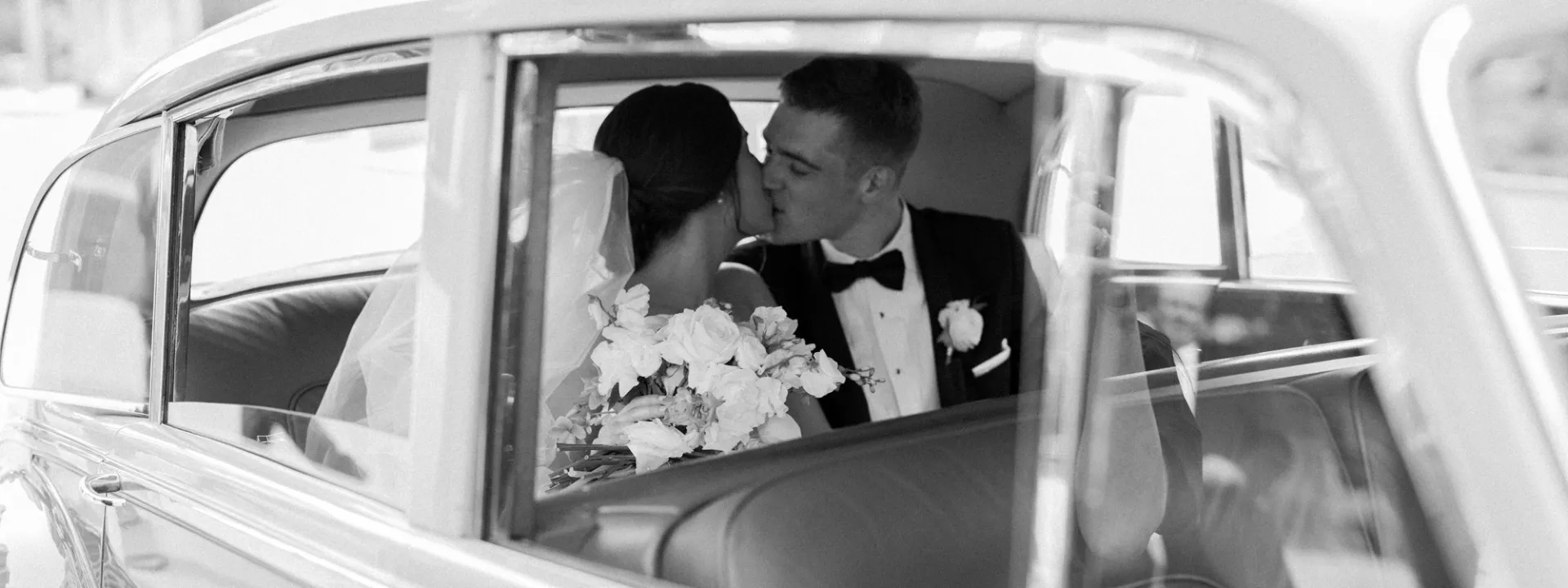 Meredith and Daniel ride off in their getaway car on their wedding day 