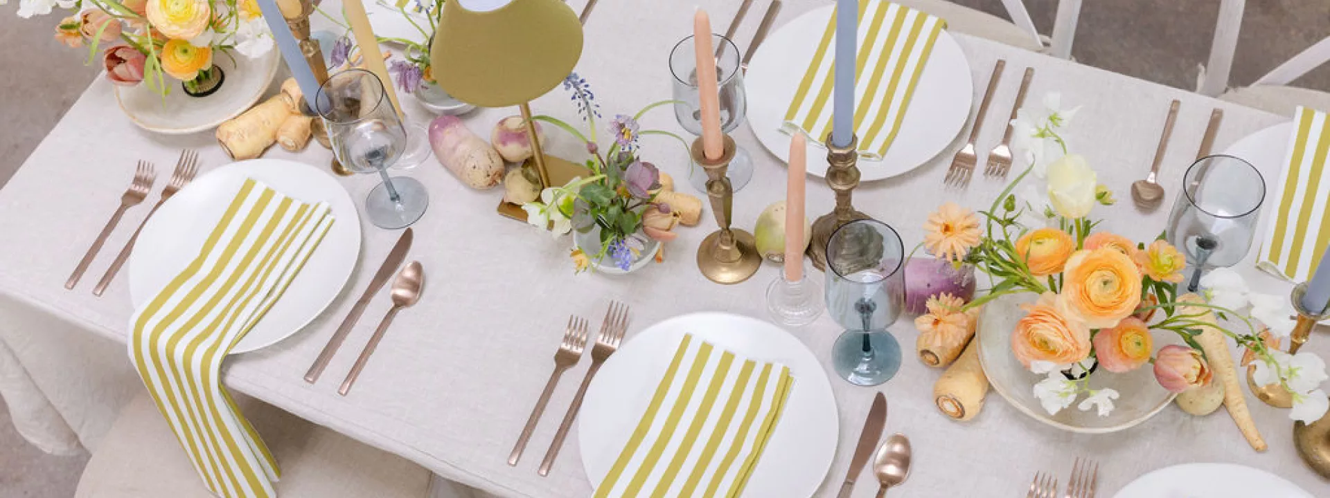Light and airy tablescape featuring a palette of soft pastels, local blooms and vegetable details at The Whim