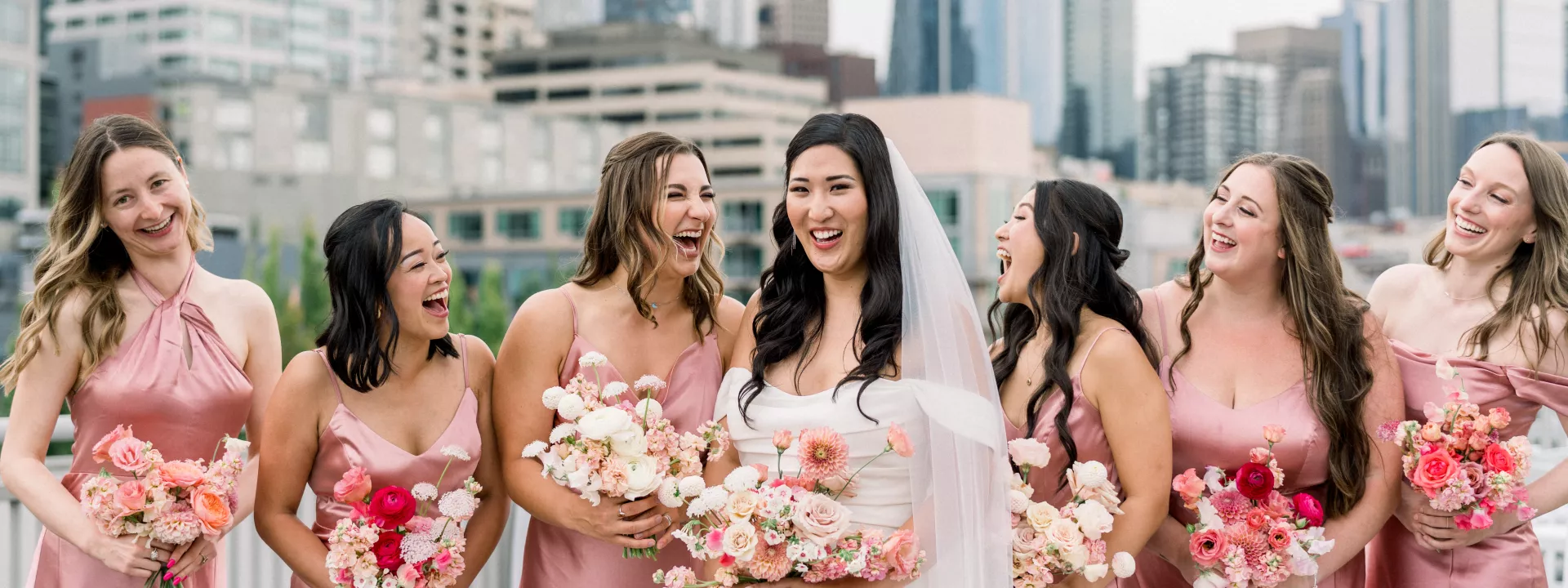 Brilliana and her Bridesmaids are All Smiles in front of the Seattle Skyline