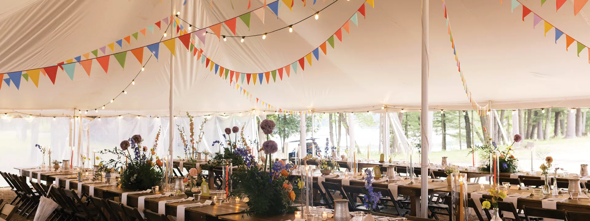 Tented wedding reception with handmade details at Camp Elsewhere 