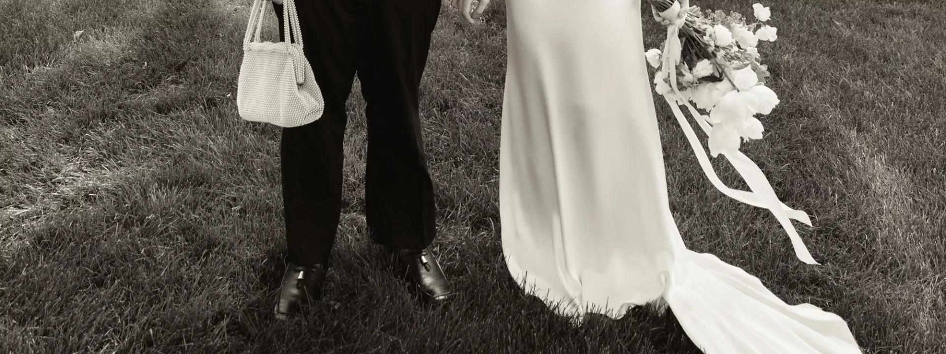 Bottom half of Addie and Walker's wedding day ensembles, in black and white