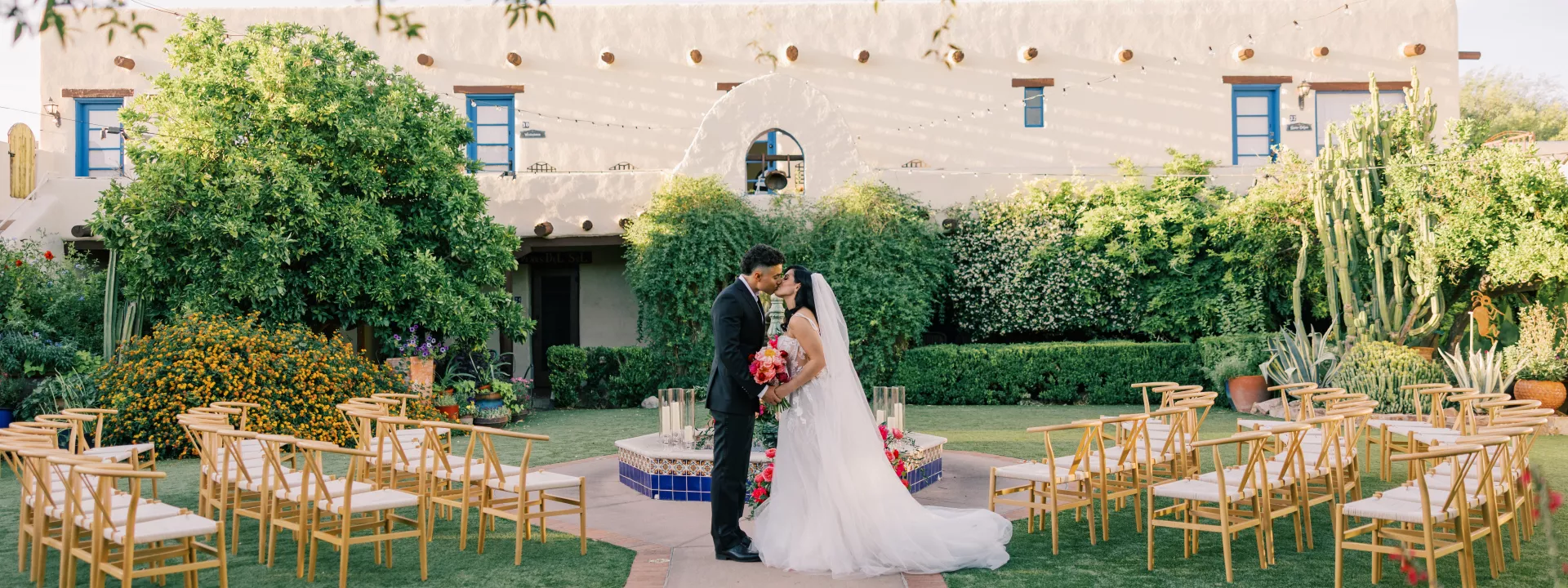 Models stand at the center of a circlular ceremony set-up in romantic editorial at Hacienda del Sol