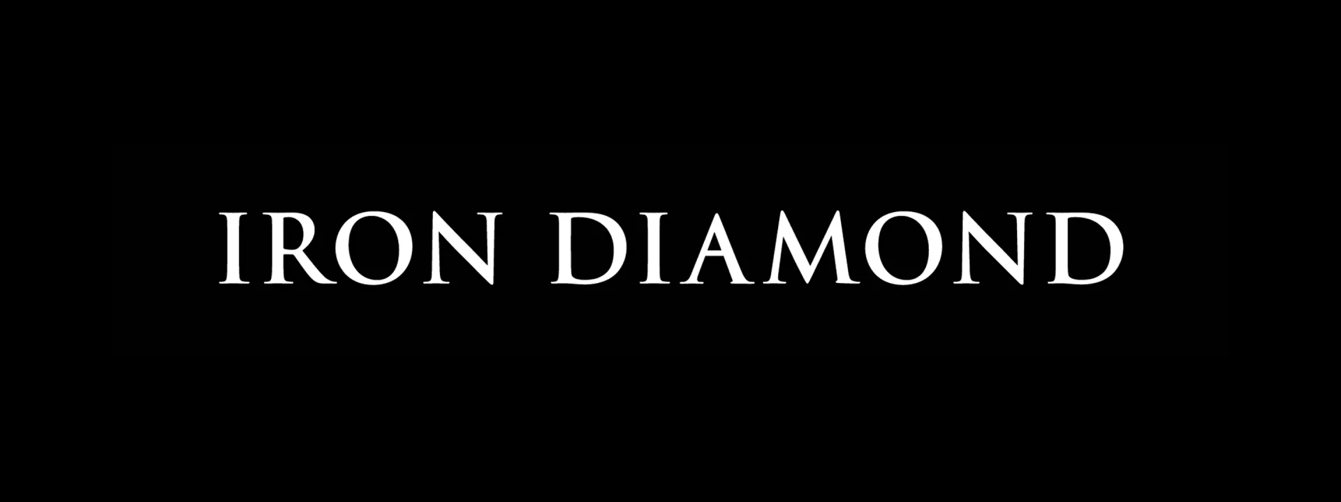 white Iron Diamond logo against black background