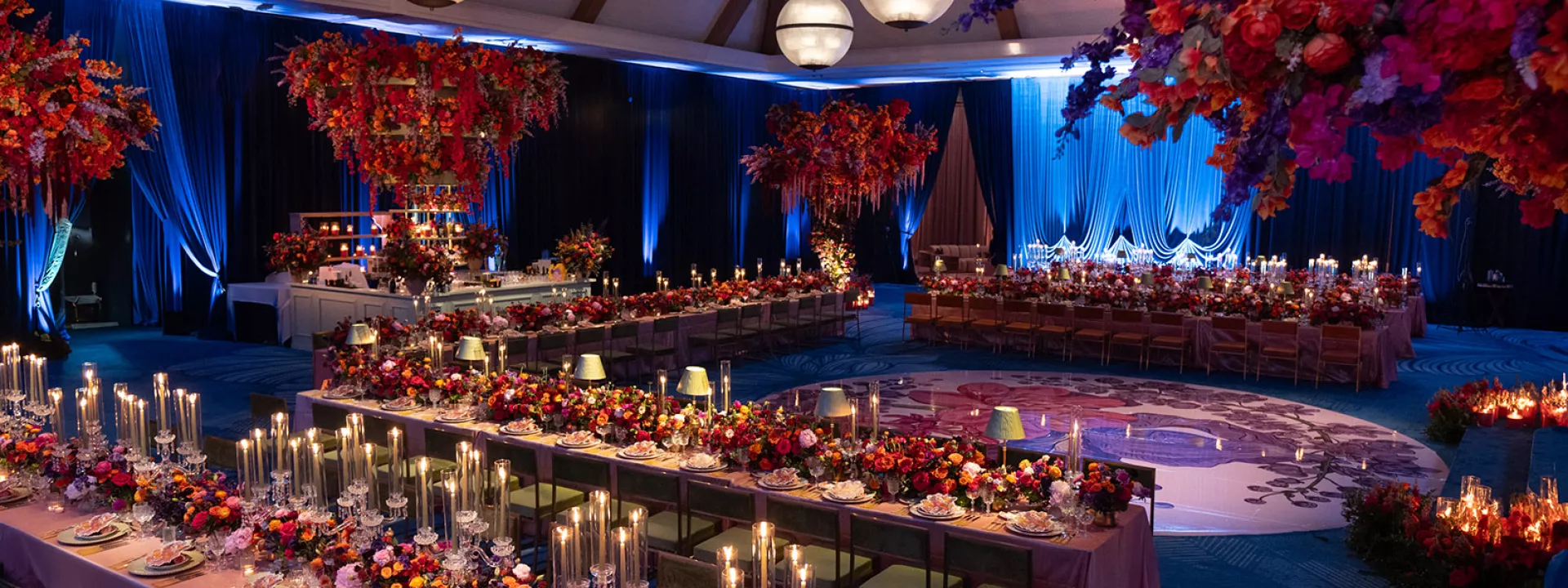 Award-winning jewel-toned reception scene at Hotel del Coronado