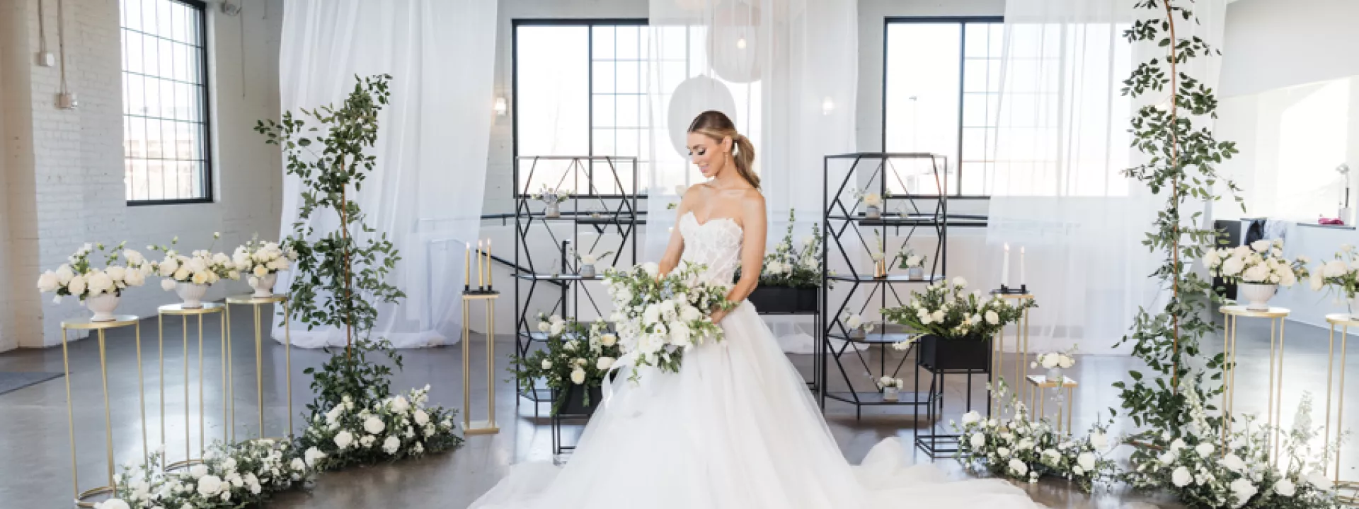 Model Poses in Surrounded by Fresh Florals in Styled Shoot at The Lowlands