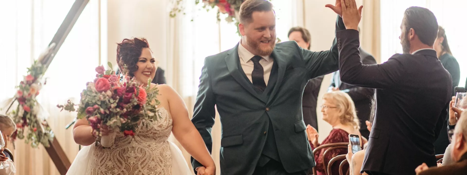 Molly and Kevin Smile as they Walk Down the Aisle after Exchanging Vows at Holbrooke Hotel