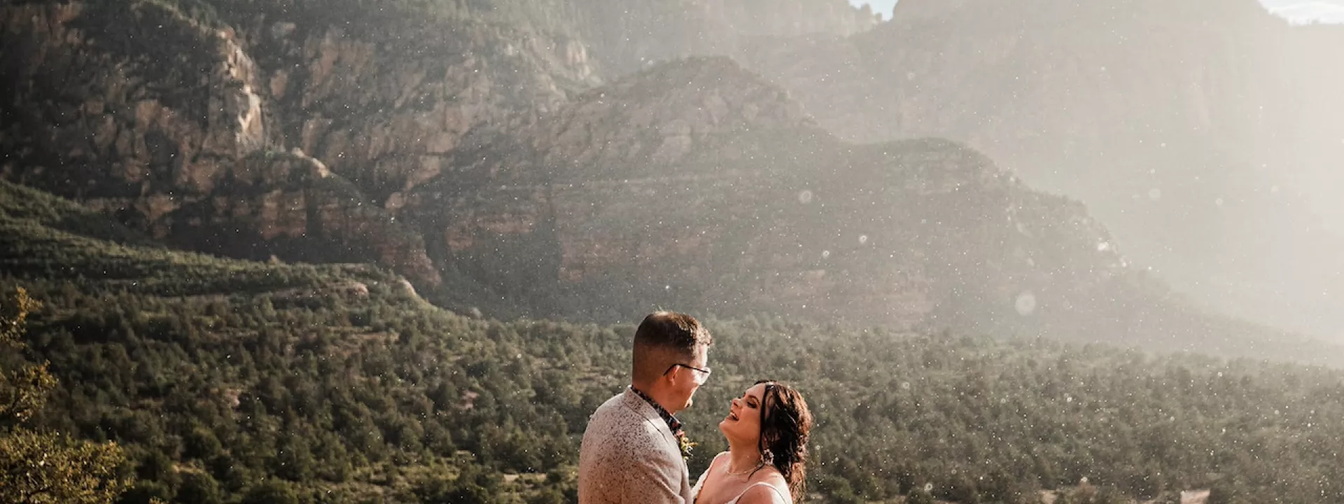 Raynie and Steven Get Caught in a Sun Shower Adding Romance to their Red Rock Elopement in Sedona