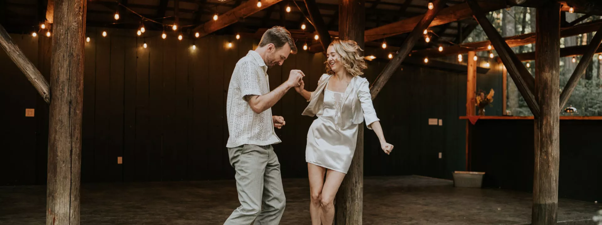 Marjean and Dan start the dancing in their reception attire at Loloma Lodge