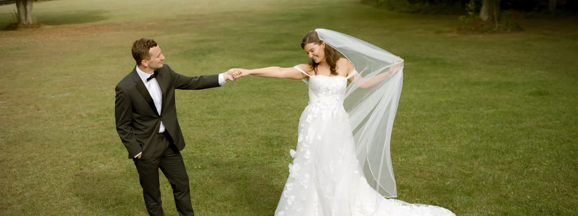 Clare and Tom pose on their wedding day at Alpine Resort