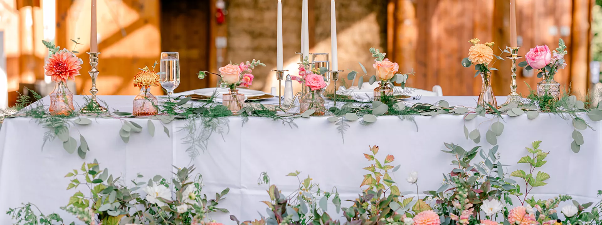 Intricate Tablescape Featuring Peachy Florals in Haley and Matthews Wedding at Mountain Springs Lodge