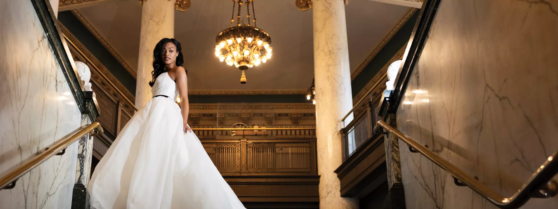 Model poses in trendy wedding gown at The Society