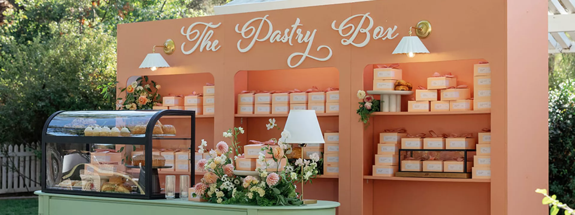 Colorful pastry box escort card display 