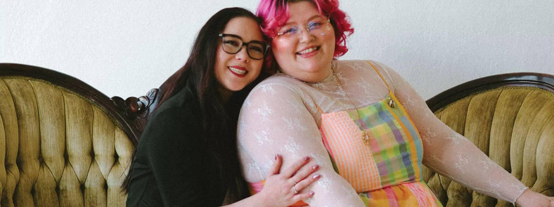 Owners of Honeybee Bridal pose for a photo 