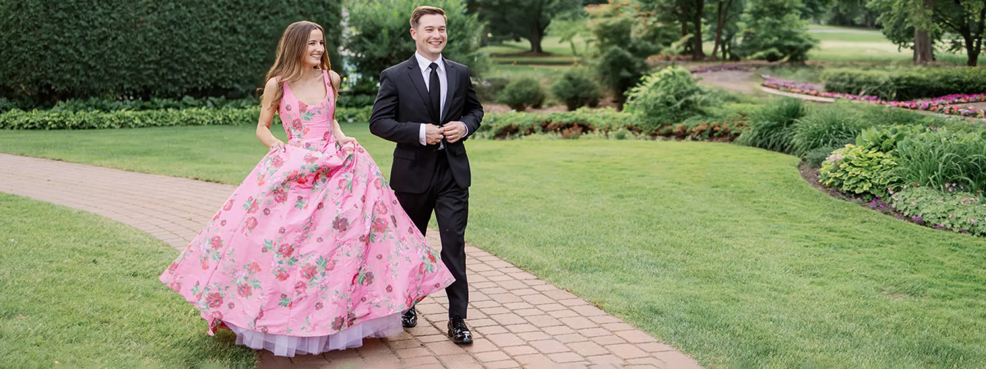 Bride and groom pose together on their winning wedding day