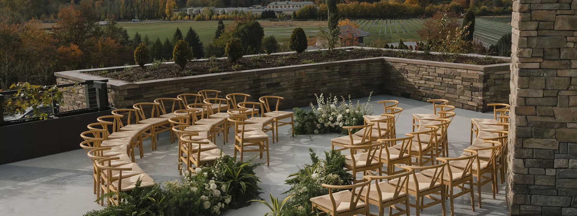 Circular outdoor reception adorned with lush greenery in imagined wedding day at SOMM Hotel & Spa