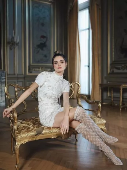 Model Poses Showing Off Bella Belle's Newest Bridal Collection