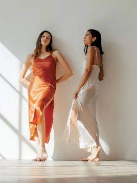 Two Models Pose in The Ruby Dress by Vincente