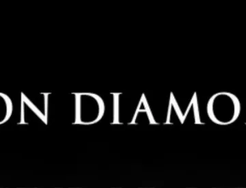 white Iron Diamond logo against black background